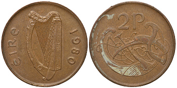 ИРЛАНДИЯ 2 ПЕНСА 1980 ВИНЬЕТКА В ВИДЕ СТИЛИЗОВАННОЙ ПТИЦЫ ИЗ ВТОРОЙ БИБЛИИ КАРЛА II ЛЫСОГО KM 21 бронза 4391-1231