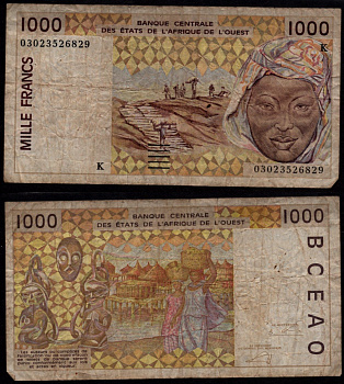 Кот-д'Ивуар 1000 франков 2003 Перевозка арахиса, Женщина, на обратной стороне: женщины, контейнеры для хранения вещей на берегу реки. Pick 111 Al бумага 7523-10-4-2