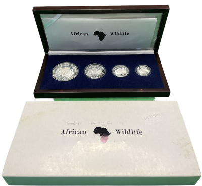 Сомали набор из 4 монет 2006 Дикая природа Африки 2006, слоны, 250, 500, 1000, 2000 шиллингов (1/4 oz, 1/2 oz, 1 oz, 2 oz), в оригинальной деревянной коробке с сертификатом №006, тираж 2000 экз. KM 197, 198, 199, 195а серебро PROOF 3-5-2-51