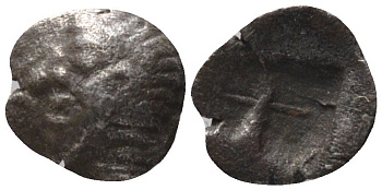 Древняя Греция, Иония (?) гемитартеморион (1/8 обола) V в. до н.э. голова / инкузное углубление, 0,09 гр серебро 1073-9-42