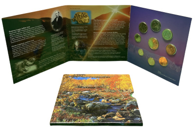 Финляндия евронабор из 8 монет + жетон 2003 золотодобытчики, официальный набор в оригинальном буклете  биметалл  UNC  7-5-6-04